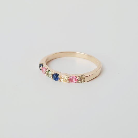 Multicoulored sapphire row ring